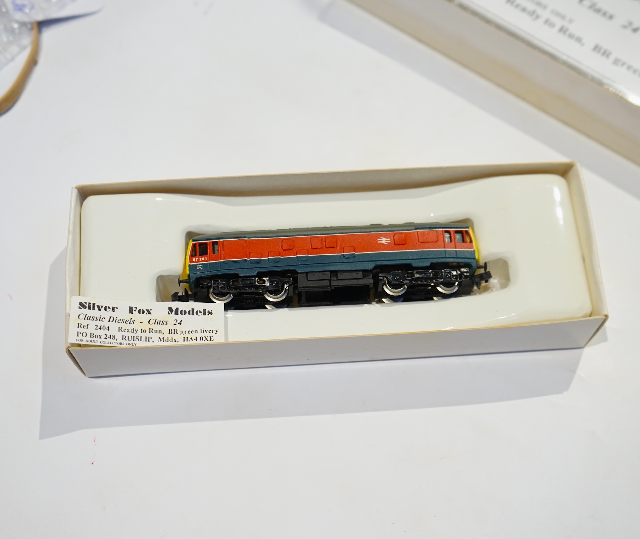 Four boxed Silver Fox Models N gauge BR Bo-Bo diesel locomotives - two Class 24 locos; one in dark green livery, D5102, and one in red and grey, 97 201, and two Class 27 locos; both in dark green livery, D5364 and 27 037